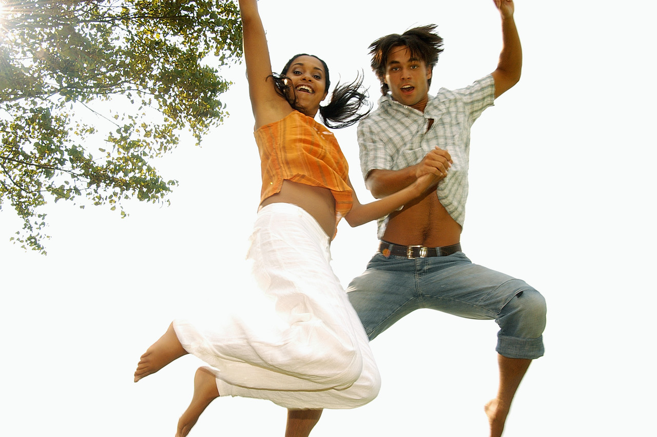 Young couple dance energetically